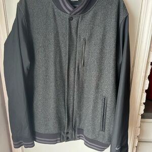 Nike men’s lightweight wool zip up athletic jacket. Gray and black XL